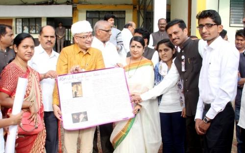 Students of Department Publishing the wall paper by the hands of Chief Guest, Principal  Dr. Deepatai Kshirsagar, Vice Principal Dr. S. V. Kshirsagar, faculty members  respected Guests and Students
