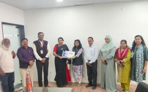 Falicitation by Honourable Dr. Deepa Tai Kshirsagar madam for getting prize in poster presentation to Ms Priyanka H. Giri